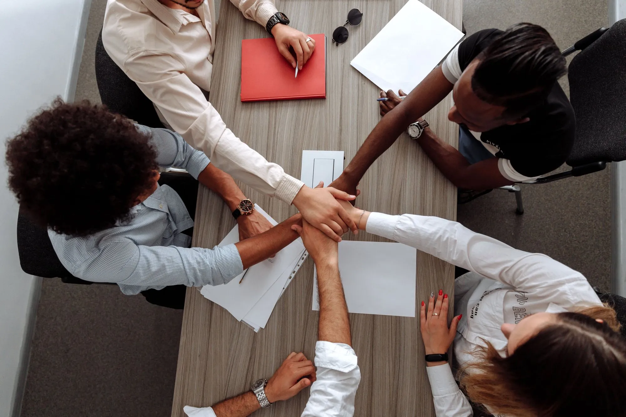 Colleagues around a table, seen from above